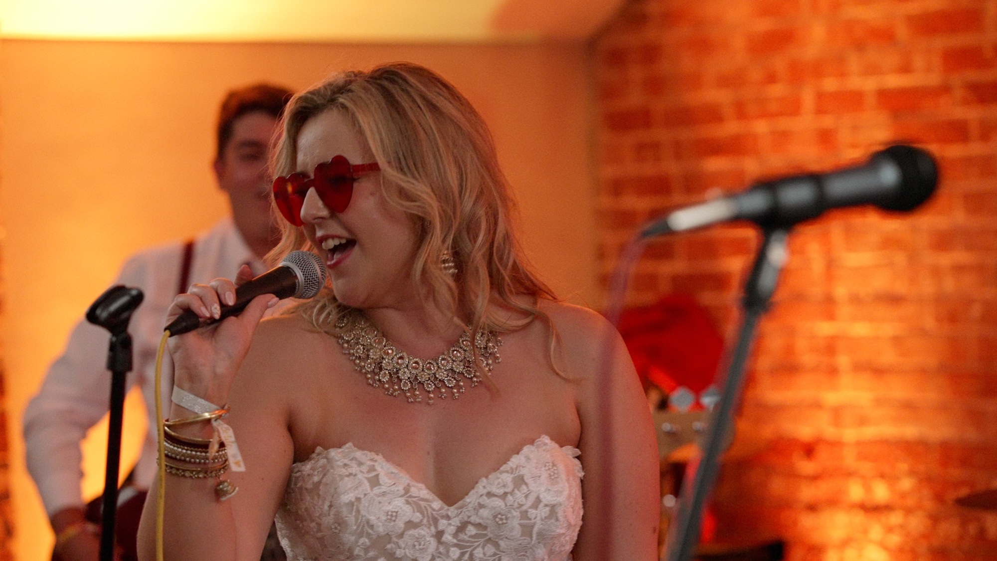 Bride singing at Grangefields festival wedding