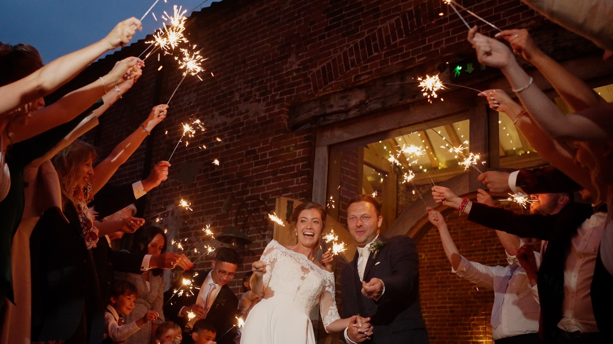 Bride & groom during sparkler exit at Hazel Gap BArn