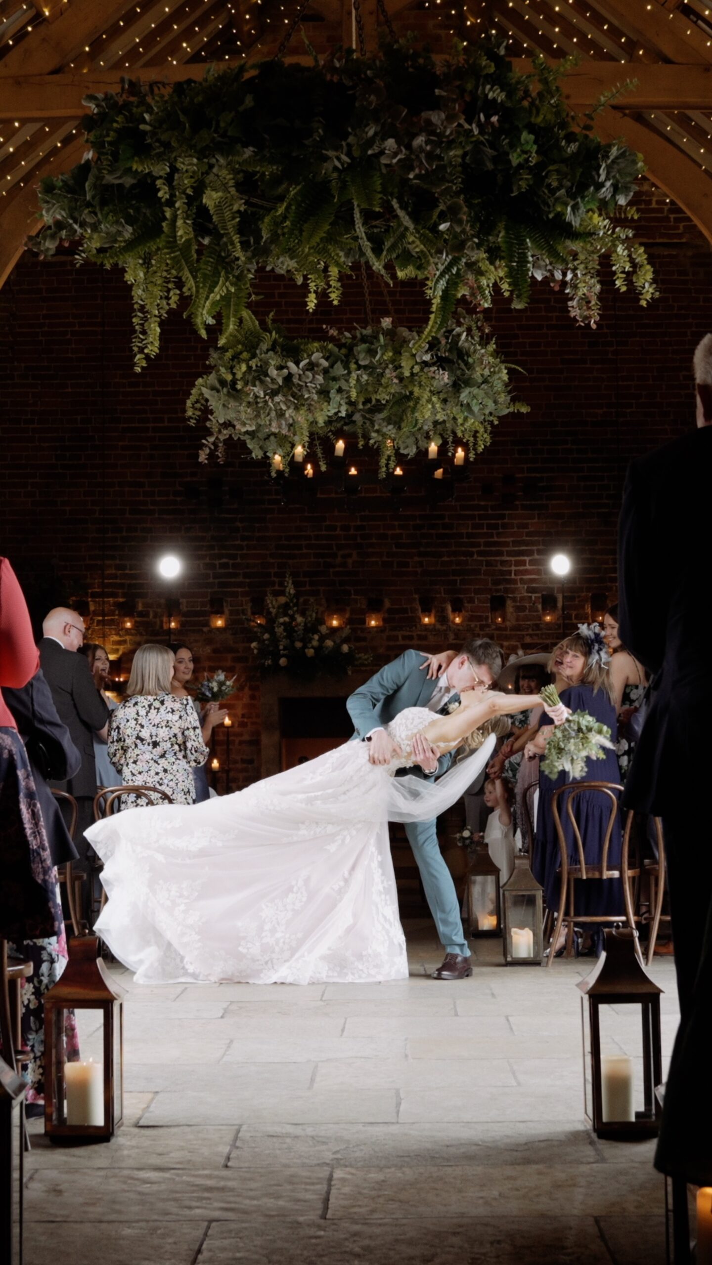 Bride and groom during dip kiss at Hazel Gap Barn