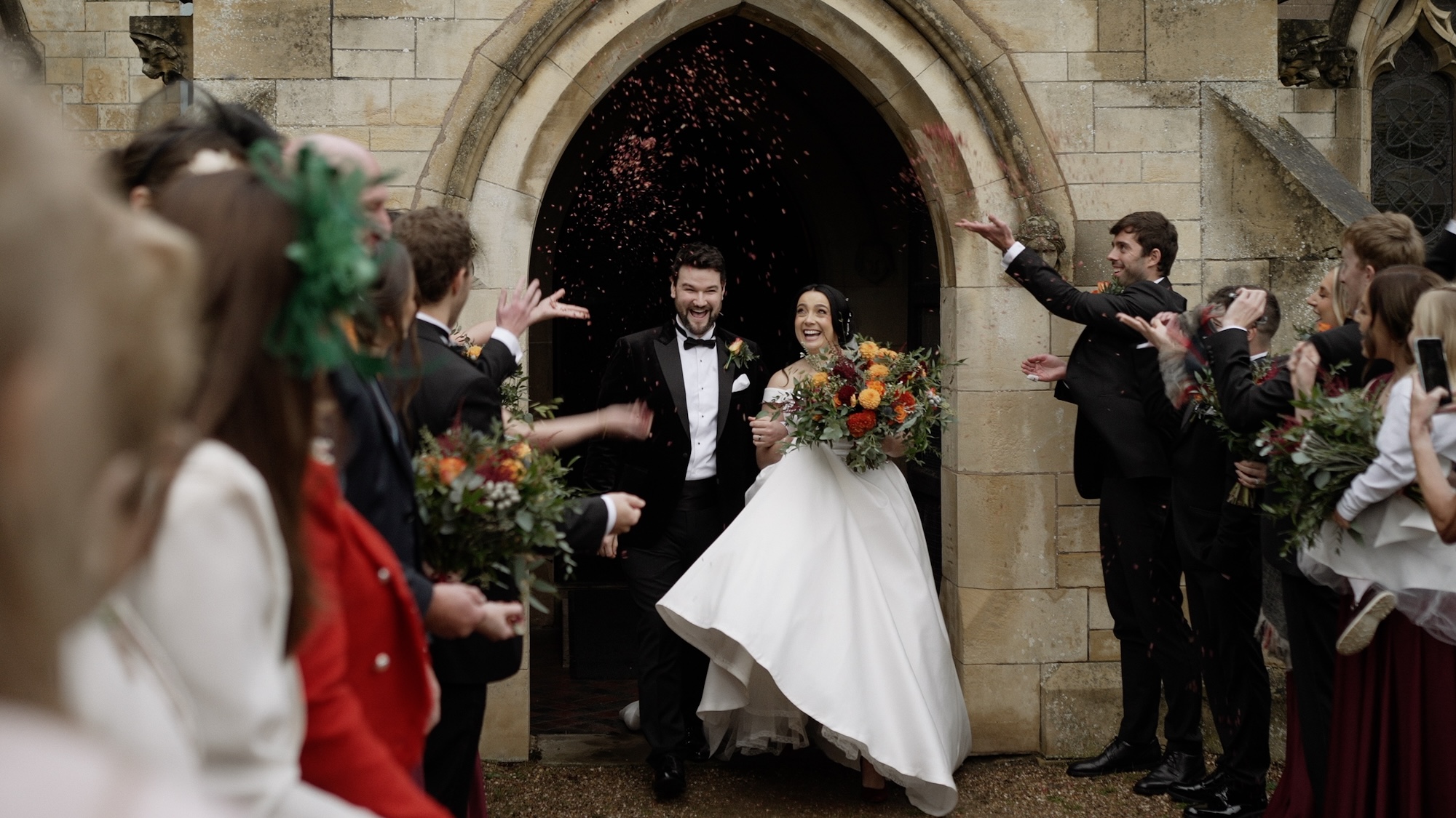 Bride and groom leaving church to go to Thoresby Hall